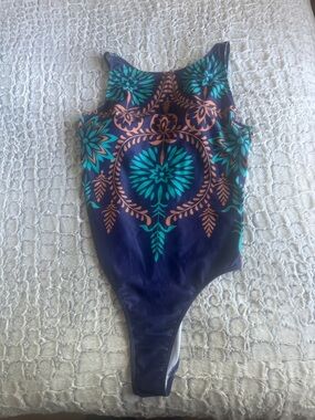 Woman’s one piece bohemian-style botanical print.